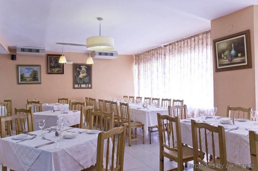Apartamentos Resitur Sevilla Restaurant bilde